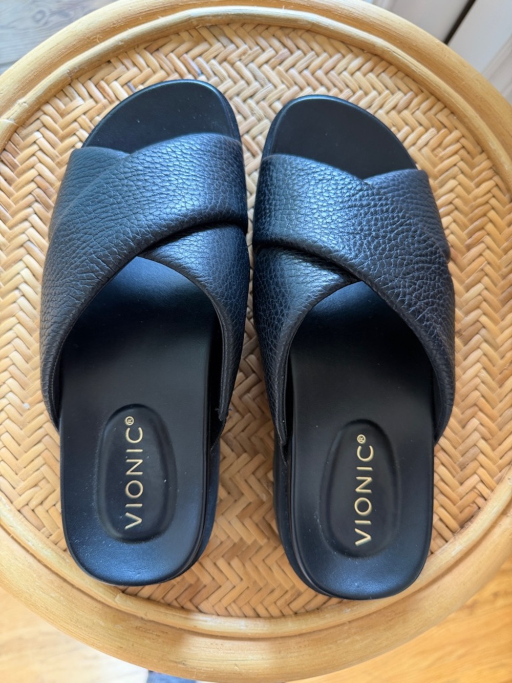 Vionic Black Crisscross Slide Mules lug sole